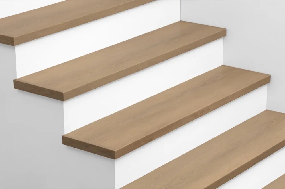 View from above of Urban Surfaces' All-In-One SPC Stair Treads installed on a staircase. Color is 2910 Bedford Creek from the Studio 12 SPC China product line.2910 Bedford Creek