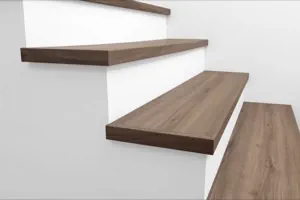 Side view of Urban Surfaces' All-In-One SPC Stair Treads installed on a staircase. Color is 2914 Berlin Terrace from the Studio 12 SPC Vietnam product line.2914 Berlin Terrace